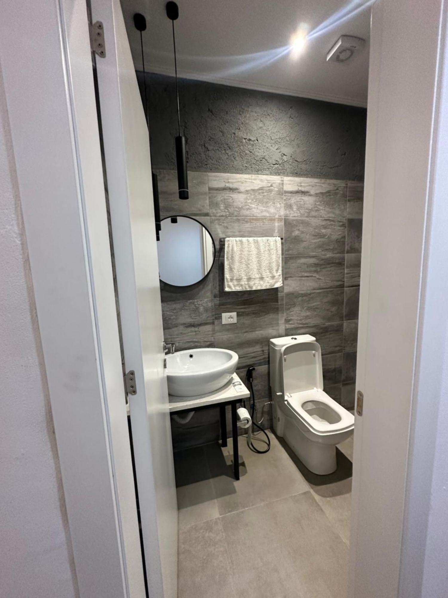 Central Comfort Suites 地拉那 外观 照片